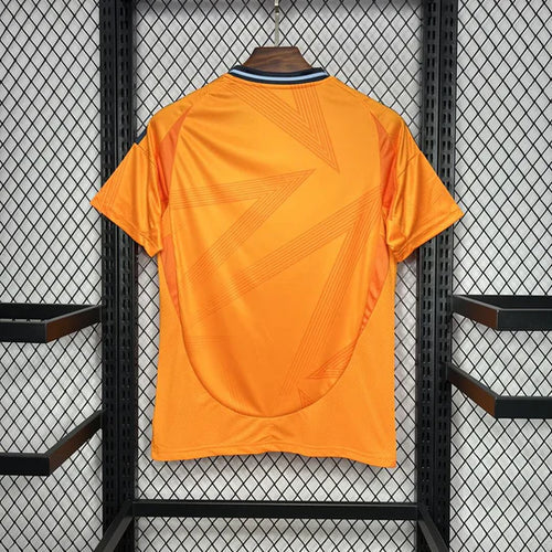 MAILLOT RÉAL MADRID - EXTÉRIEUR 2024/25 - Orange
